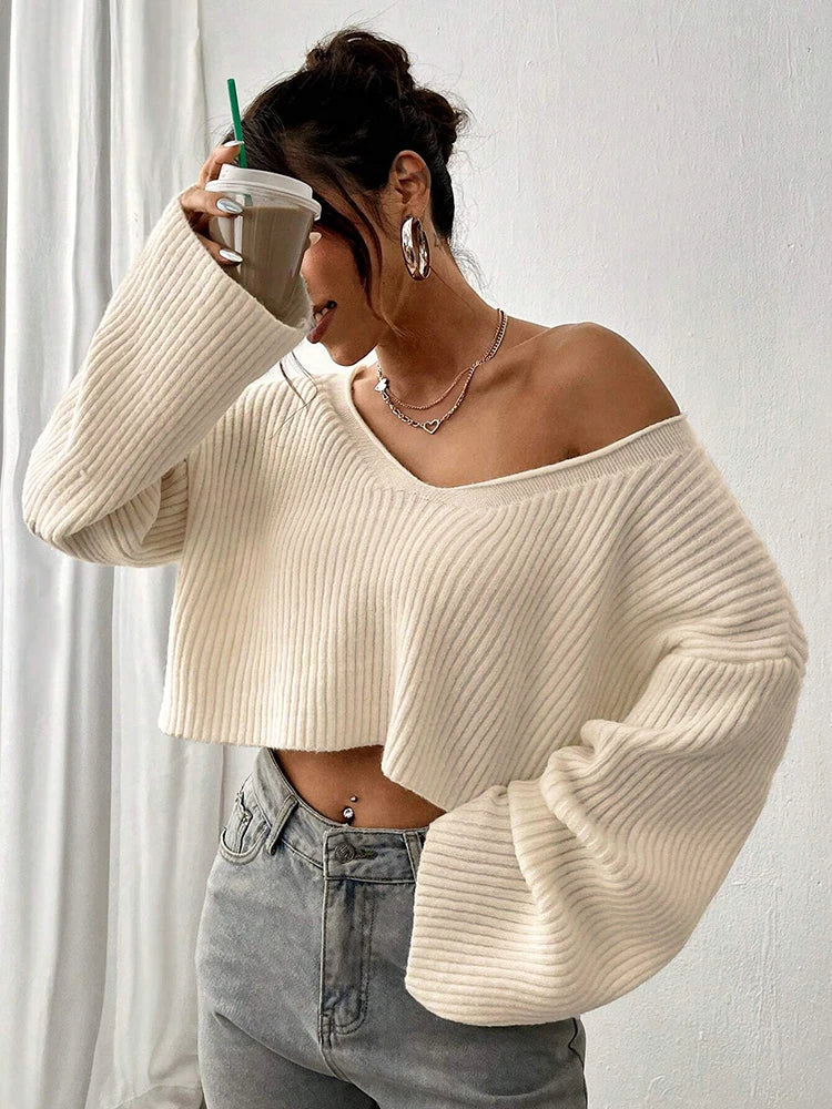 Sweater de punto liso de cuello en V