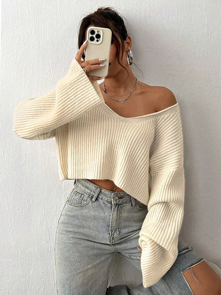 Sweater de punto liso de cuello en V
