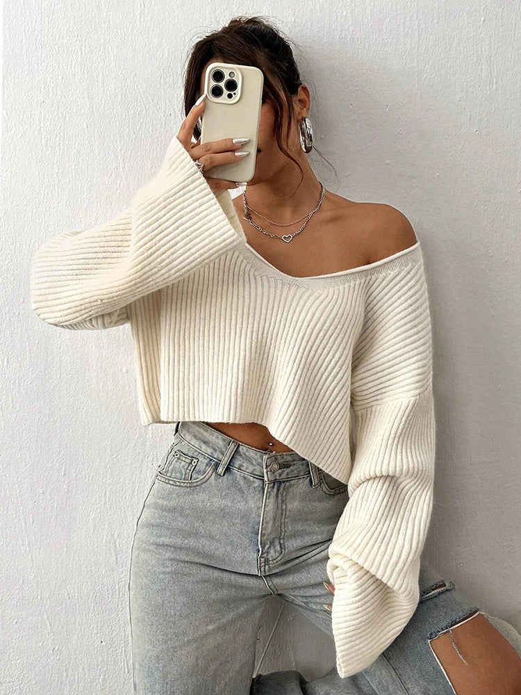Sweater de punto liso de cuello en V