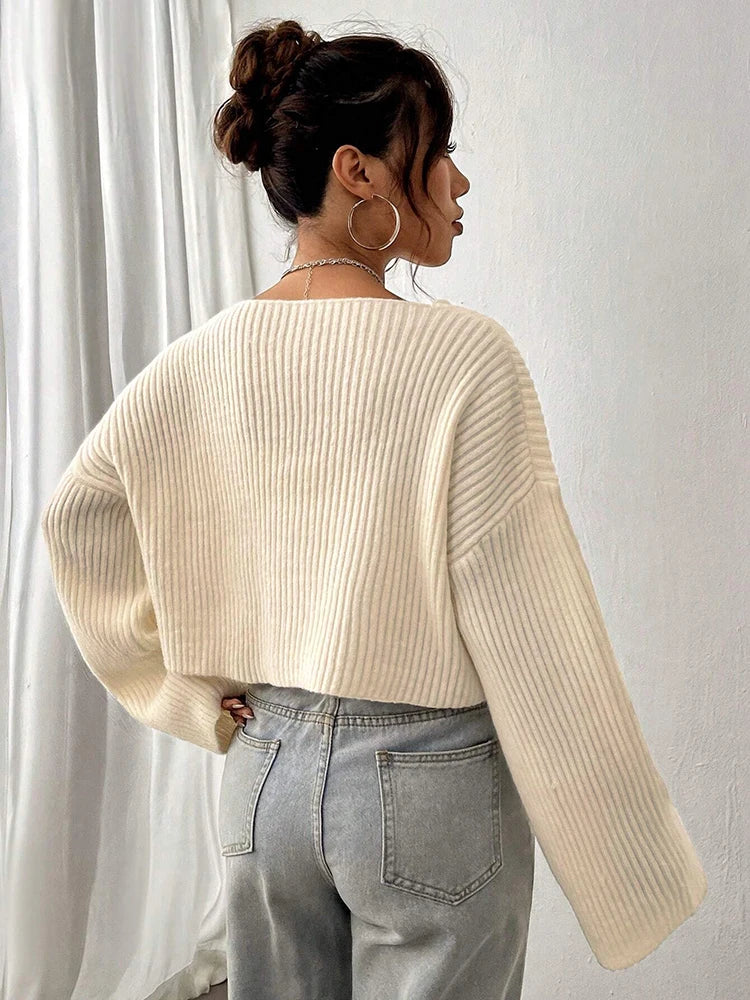 Sweater de punto liso de cuello en V
