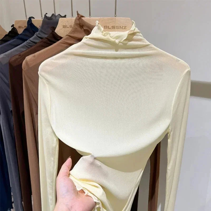 tops de malla transparentes de manga larga