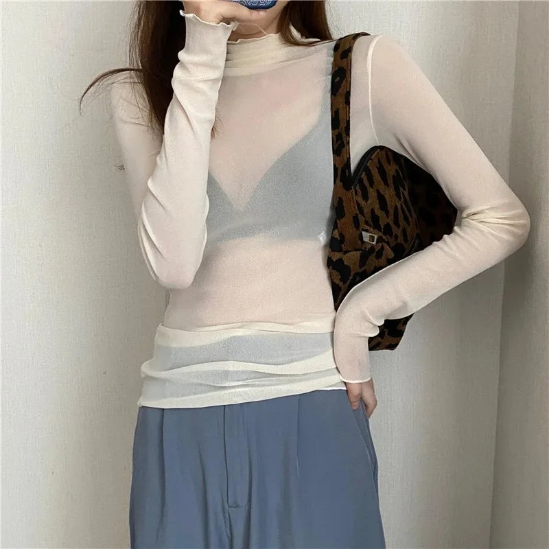 tops de malla transparentes de manga larga