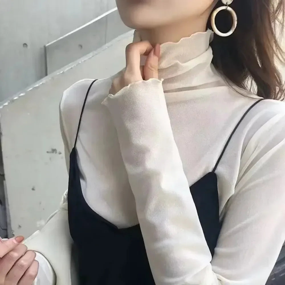 tops de malla transparentes de manga larga