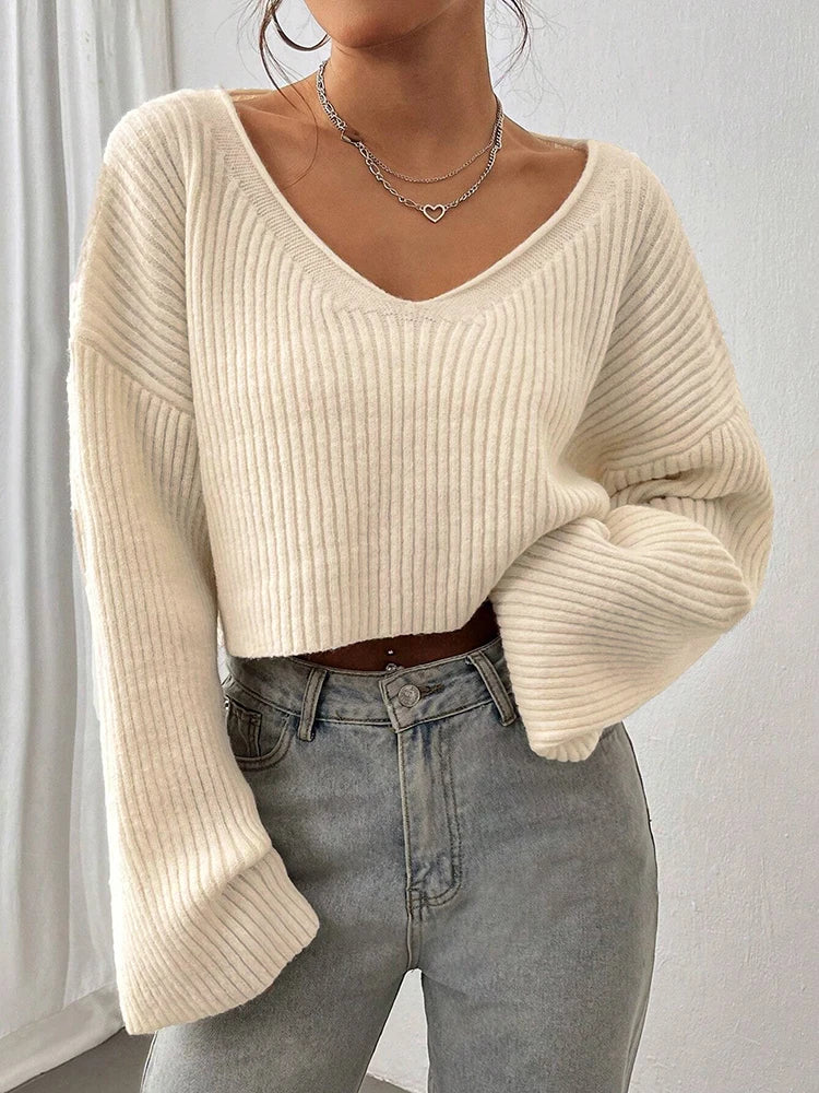 Sweater de punto liso de cuello en V